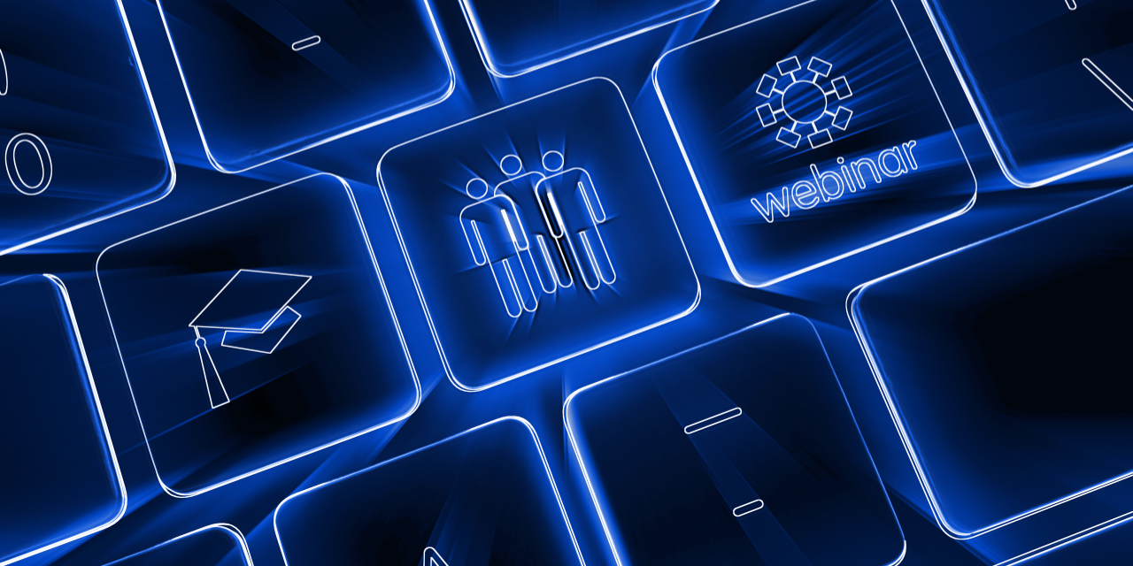 Closeup image of a keyboard with educational icons on the keys.