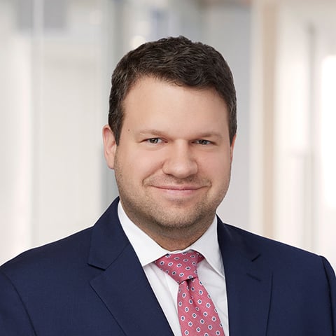 Professional headshot of Cody England