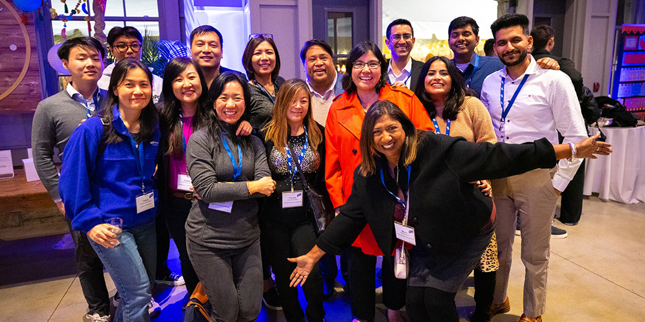 Group photo of attendees at the Baird Multicultural Community Conference